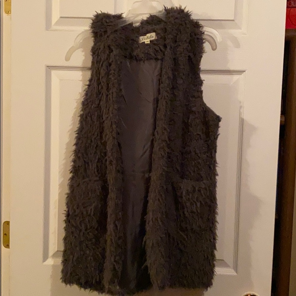 Dark gray vest with pockets and hood